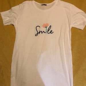 Long shirt, with cuts in the sides